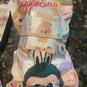 Labubu Have a Seat Labubu Baba Plush Toy with Green and Pink Accents